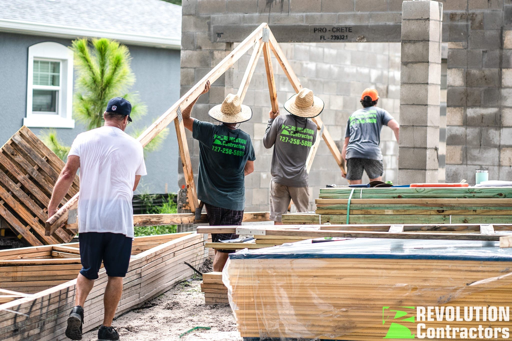 Revolution Contractors team on a St. Petersburg jobsite
