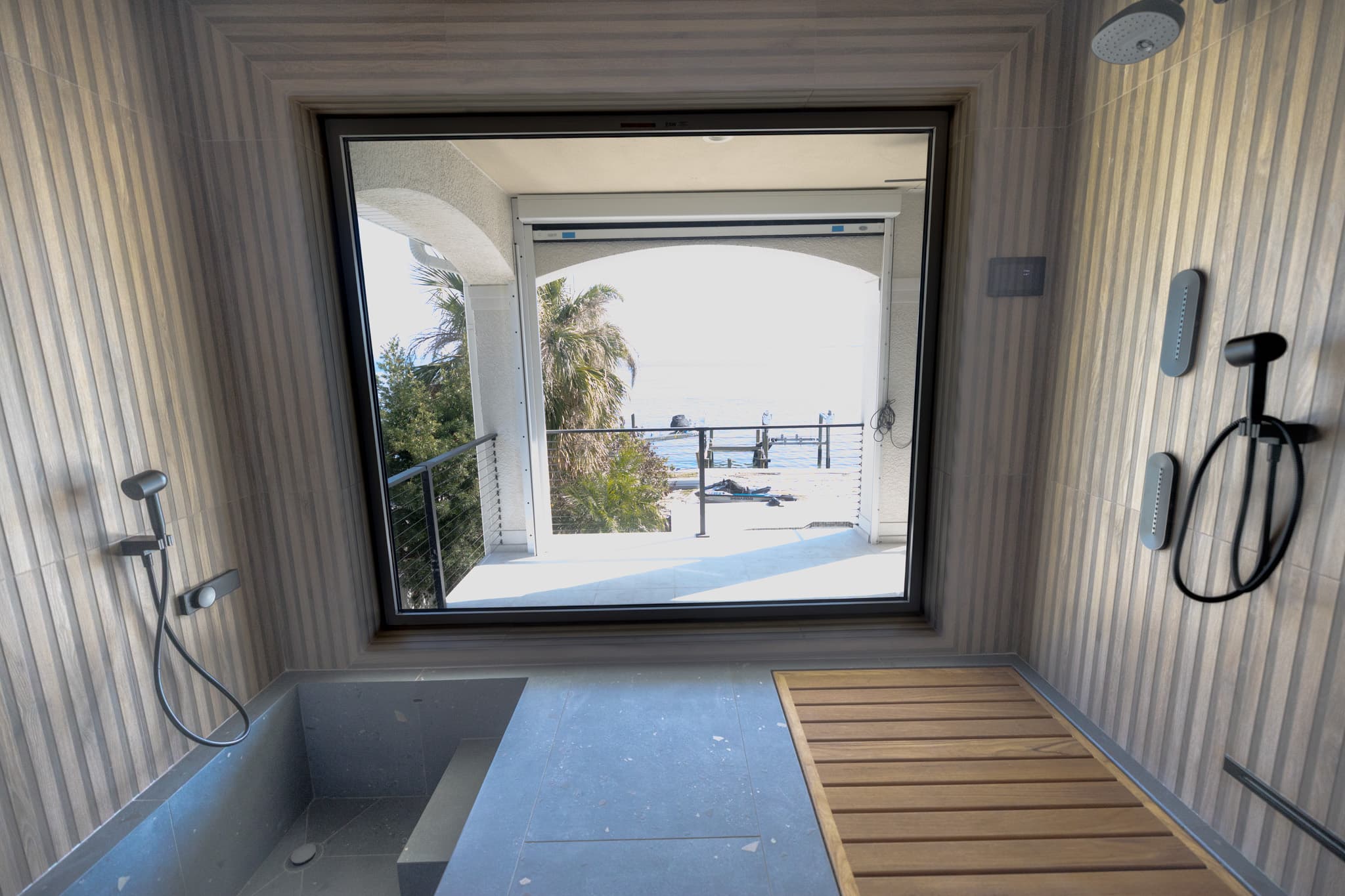 Modern accessible bathroom with wide vanity and open floor plan