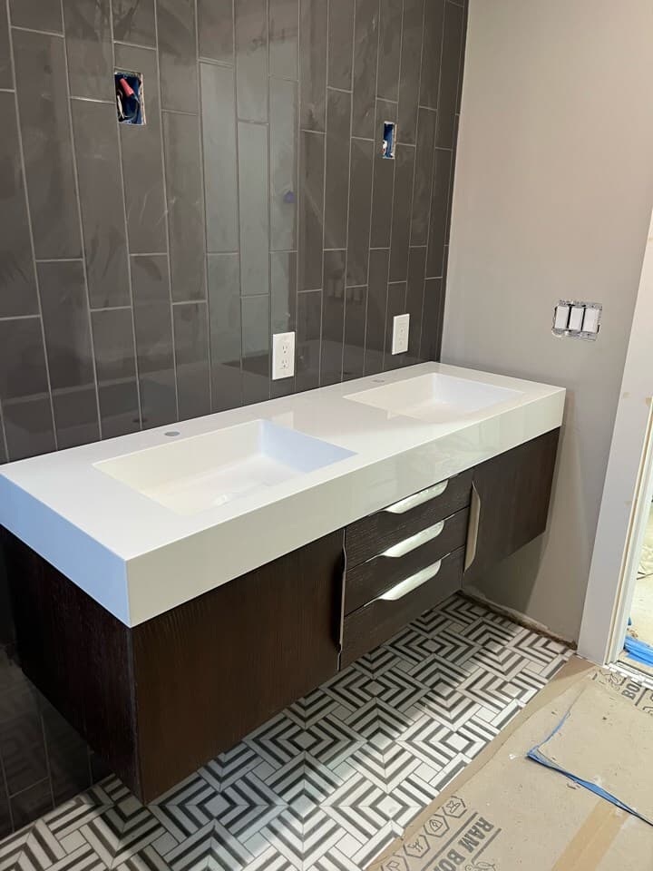 Double-sink vanity with wheelchair-accessible clearance in an aging-in-place remodel