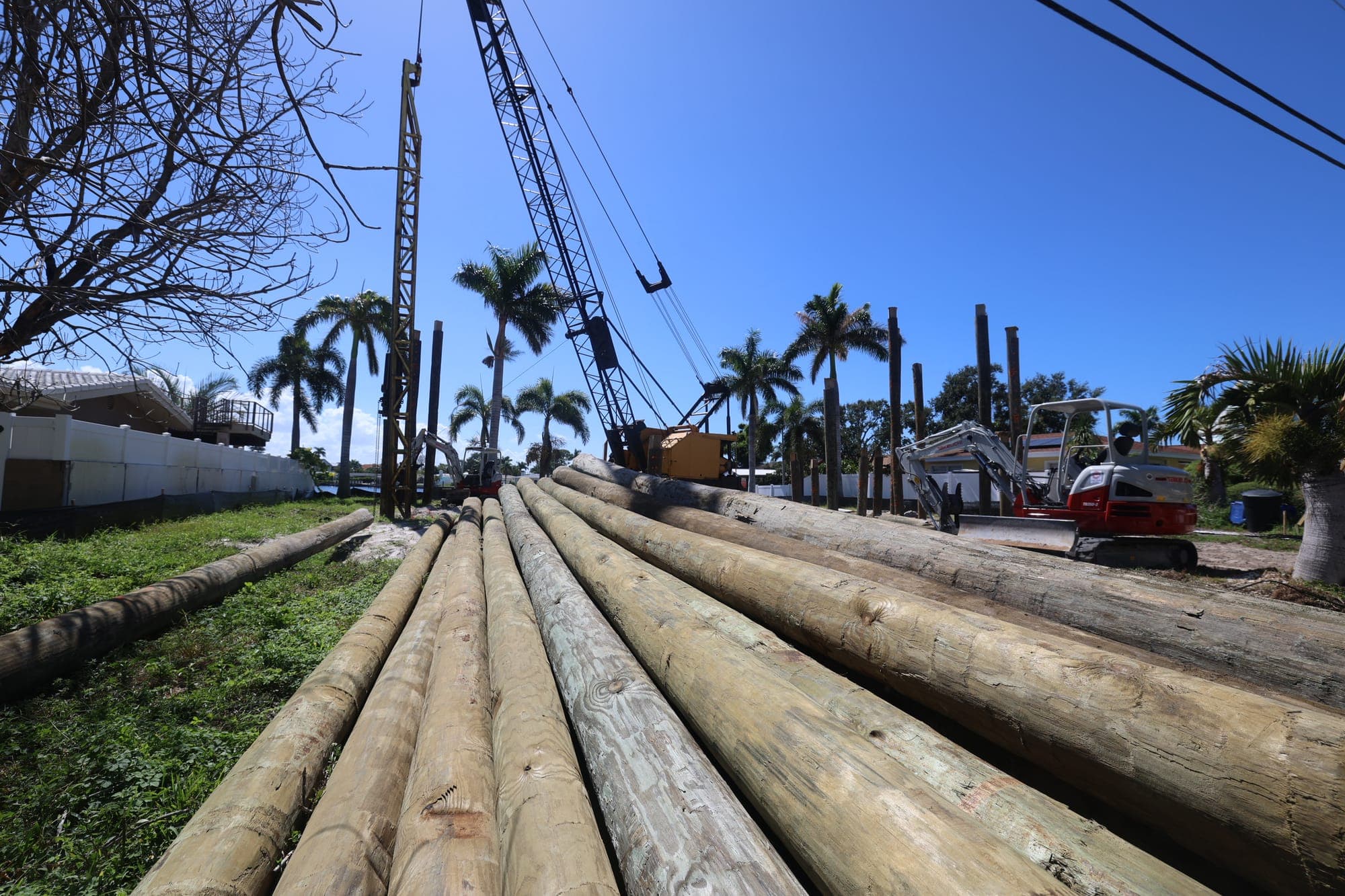 Foundation pilings being driven for a custom home construction loan draw milestone in St. Petersburg