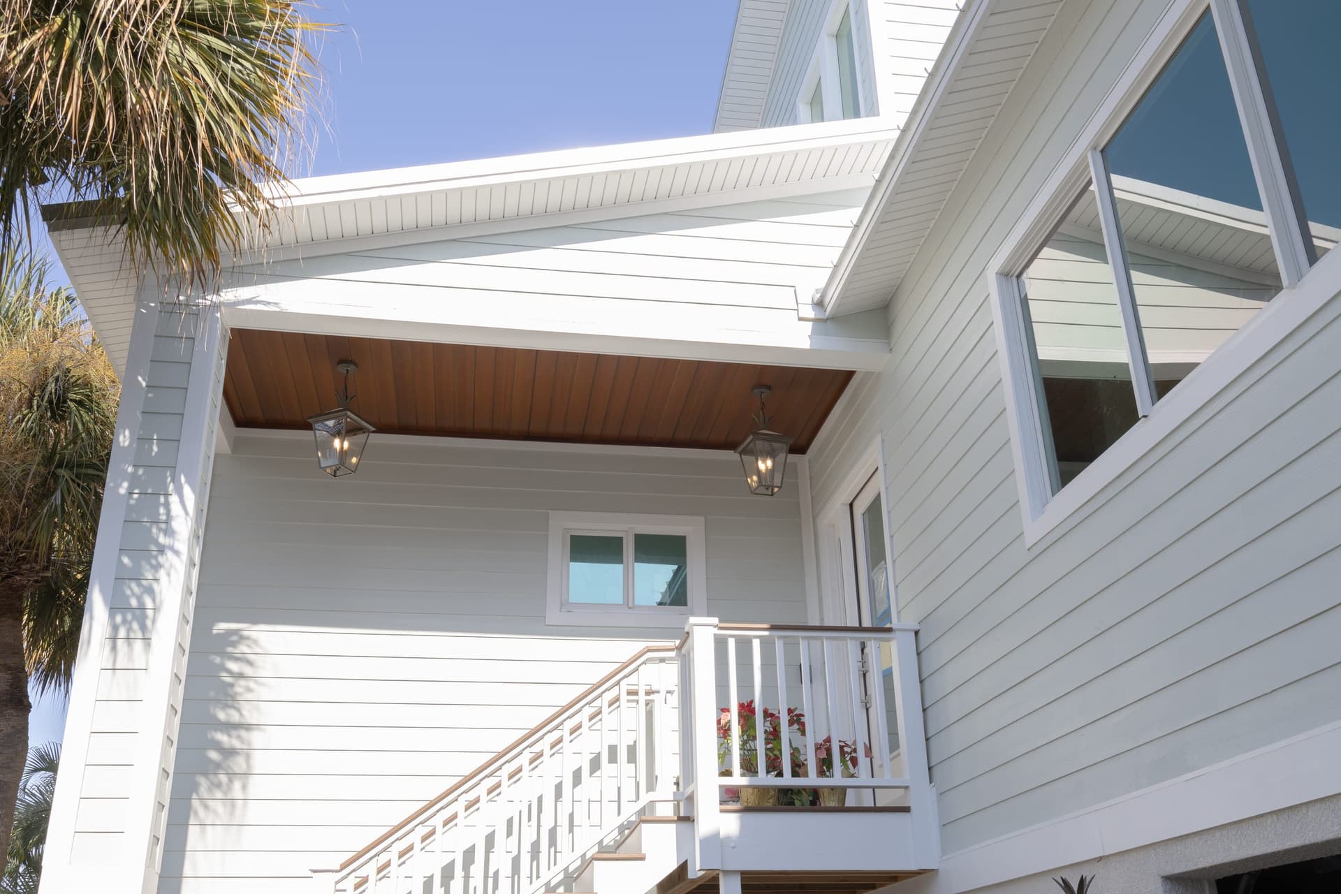 Completed elevated home with front porch in Pinellas County flood zone
