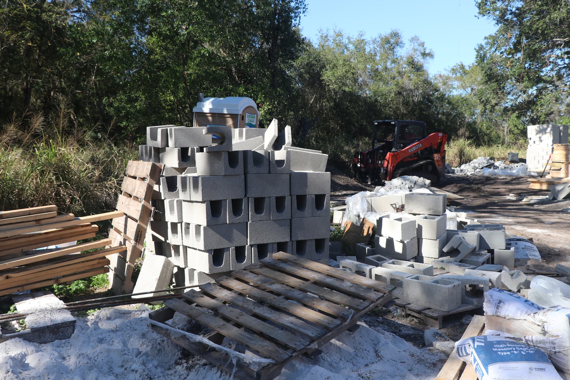 CMU block foundation staging for elevated flood zone construction in Pinellas County