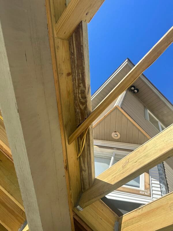 Gable-view framing for a deck and pergola addition in St. Petersburg