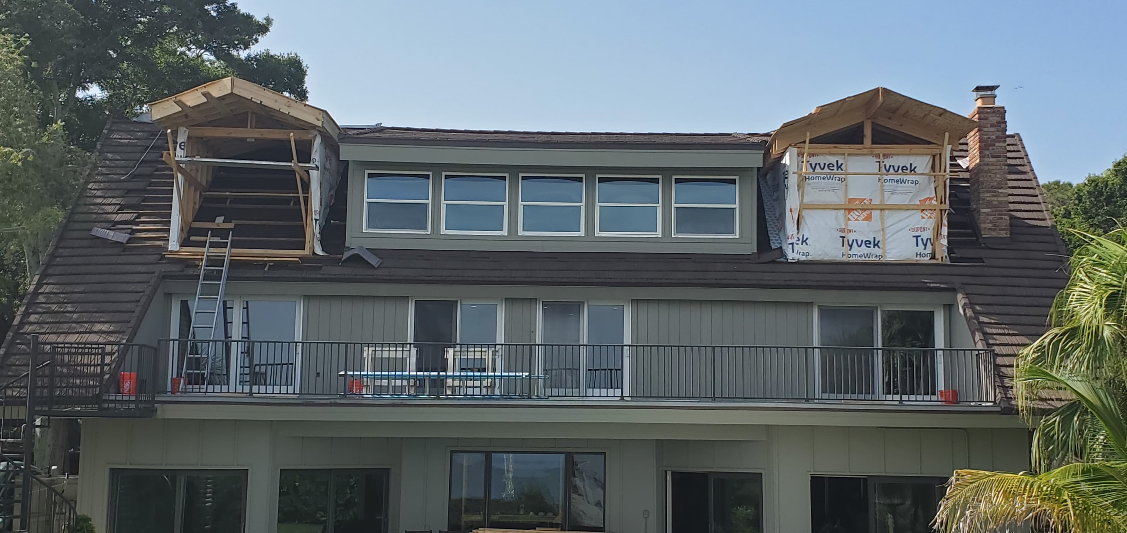 Dormer addition framing on a waterfront home showing structural expansion