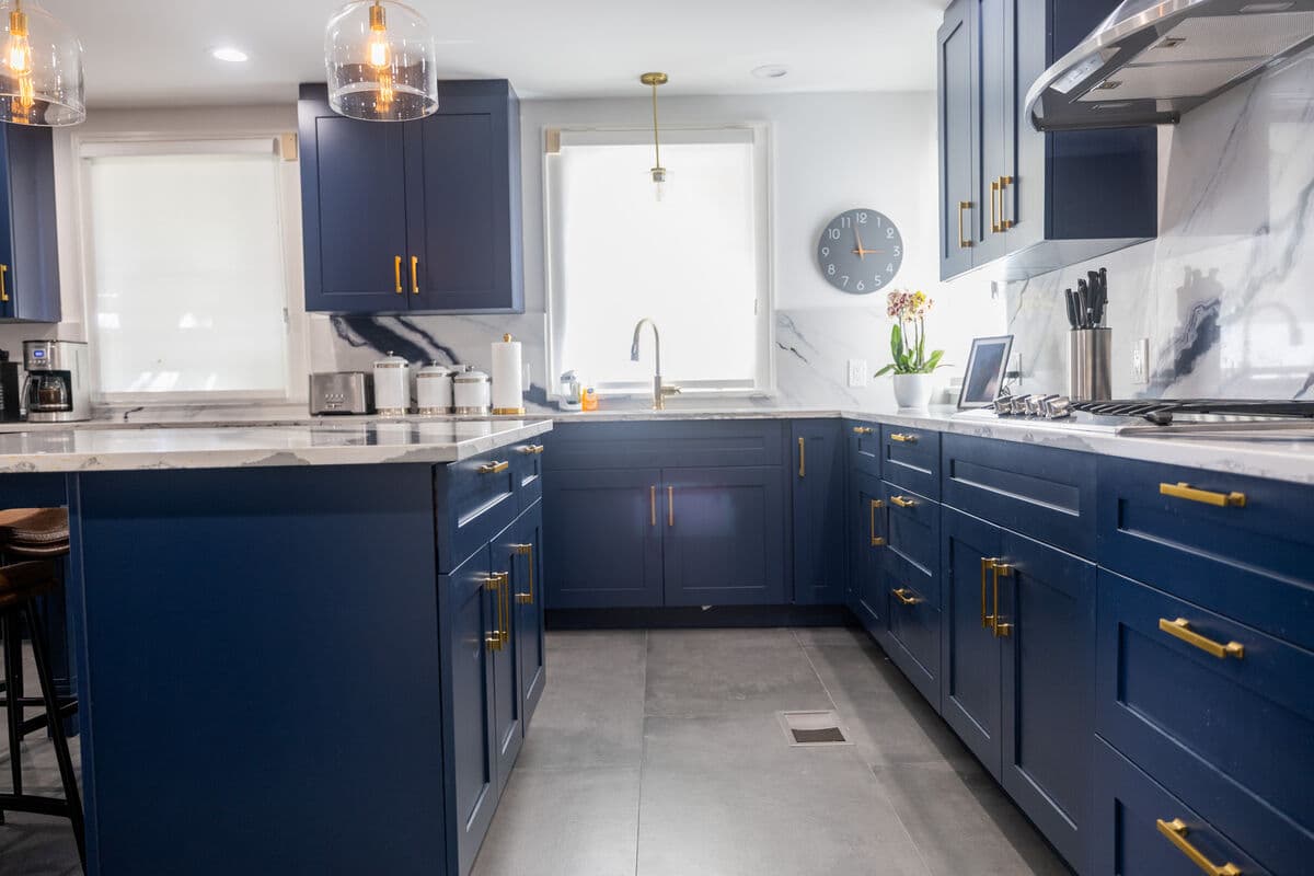 Kitchen after whole home remodel — open concept with modern cabinetry and finishes
