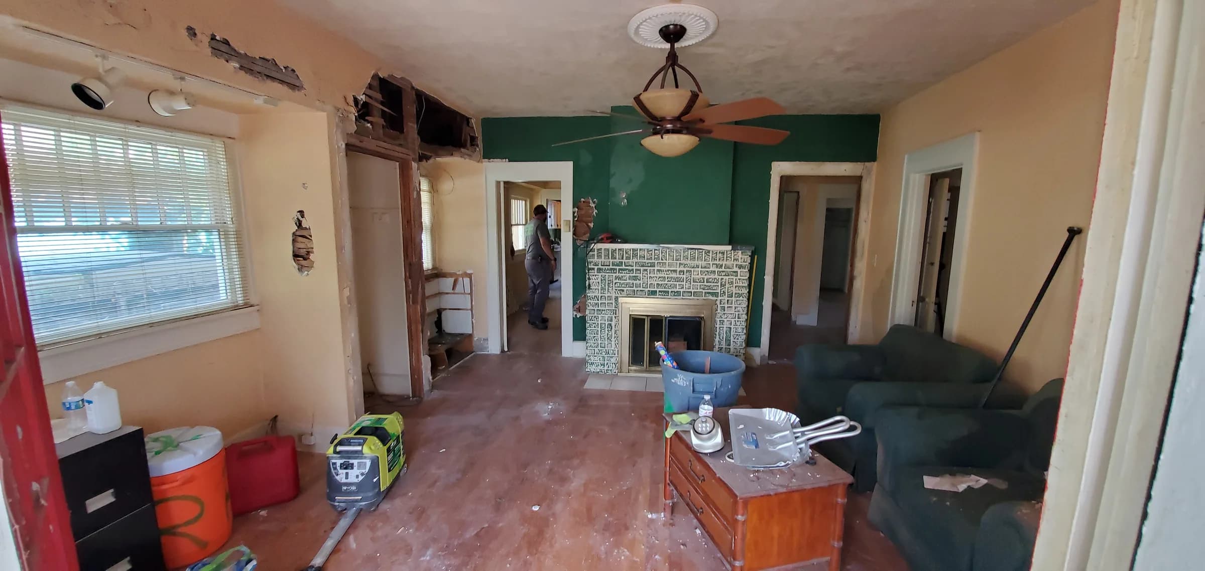 Original 1920s living room before demolition with period woodwork — 175 19th Ave SE Old Southeast historic bungalow restoration