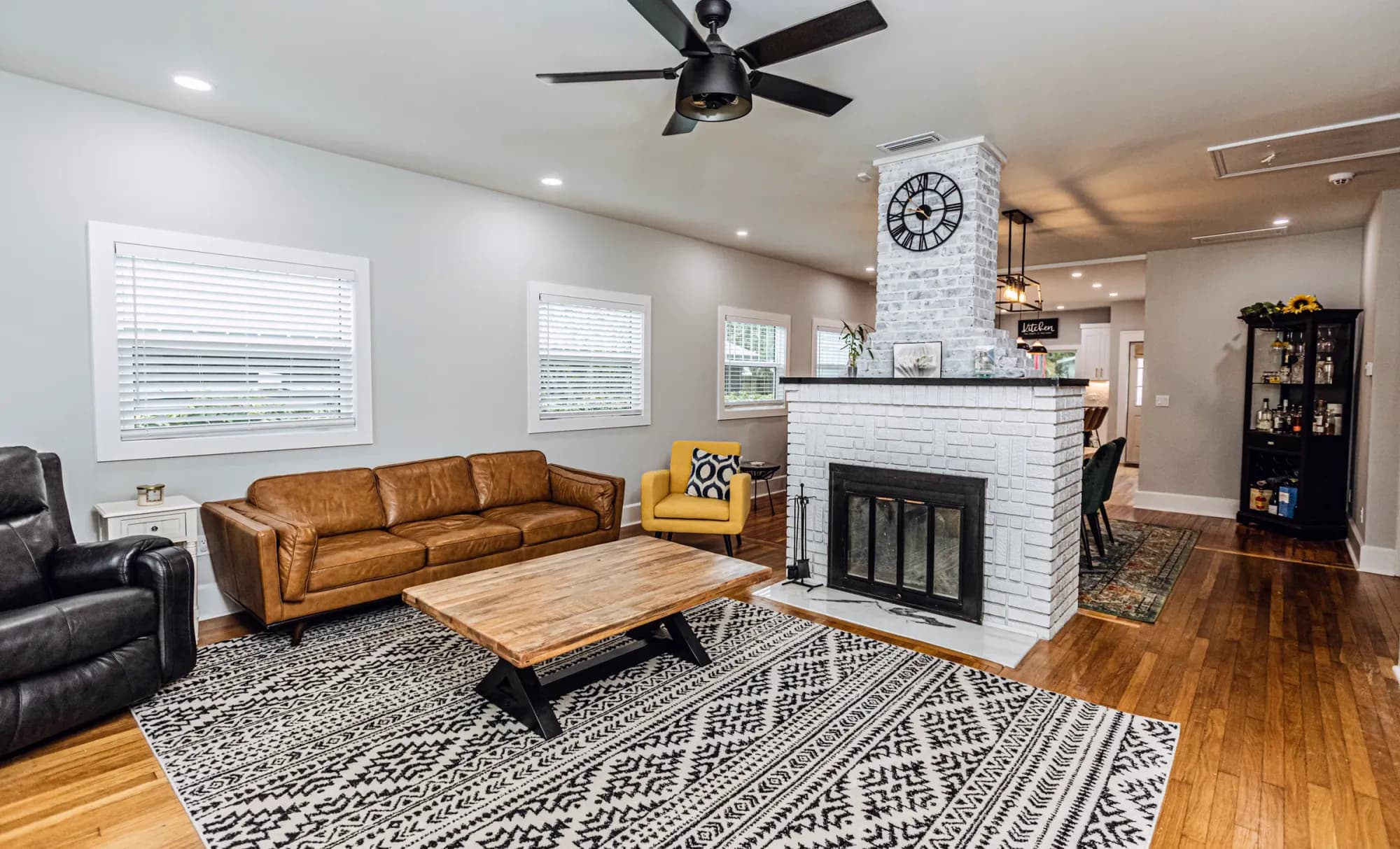 Finished living room with restored woodwork and period-appropriate finishes — 175 19th Ave SE Old Southeast historic bungalow restoration