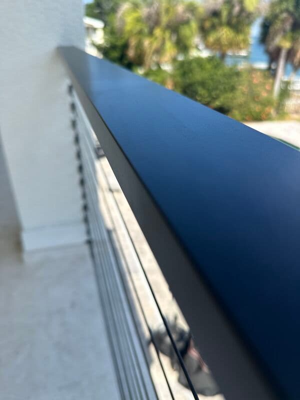 Waterfront cable railing detail on a completed Tierra Verde renovation by Revolution Contractors