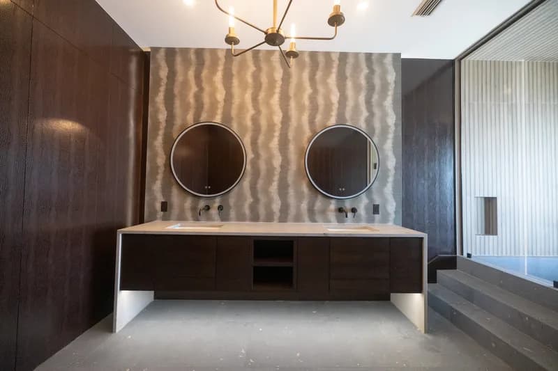 Finished bathroom remodel by Revolution Contractors