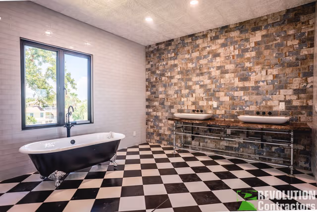 Small St. Pete bathroom with checkered tile flooring and modern vanity