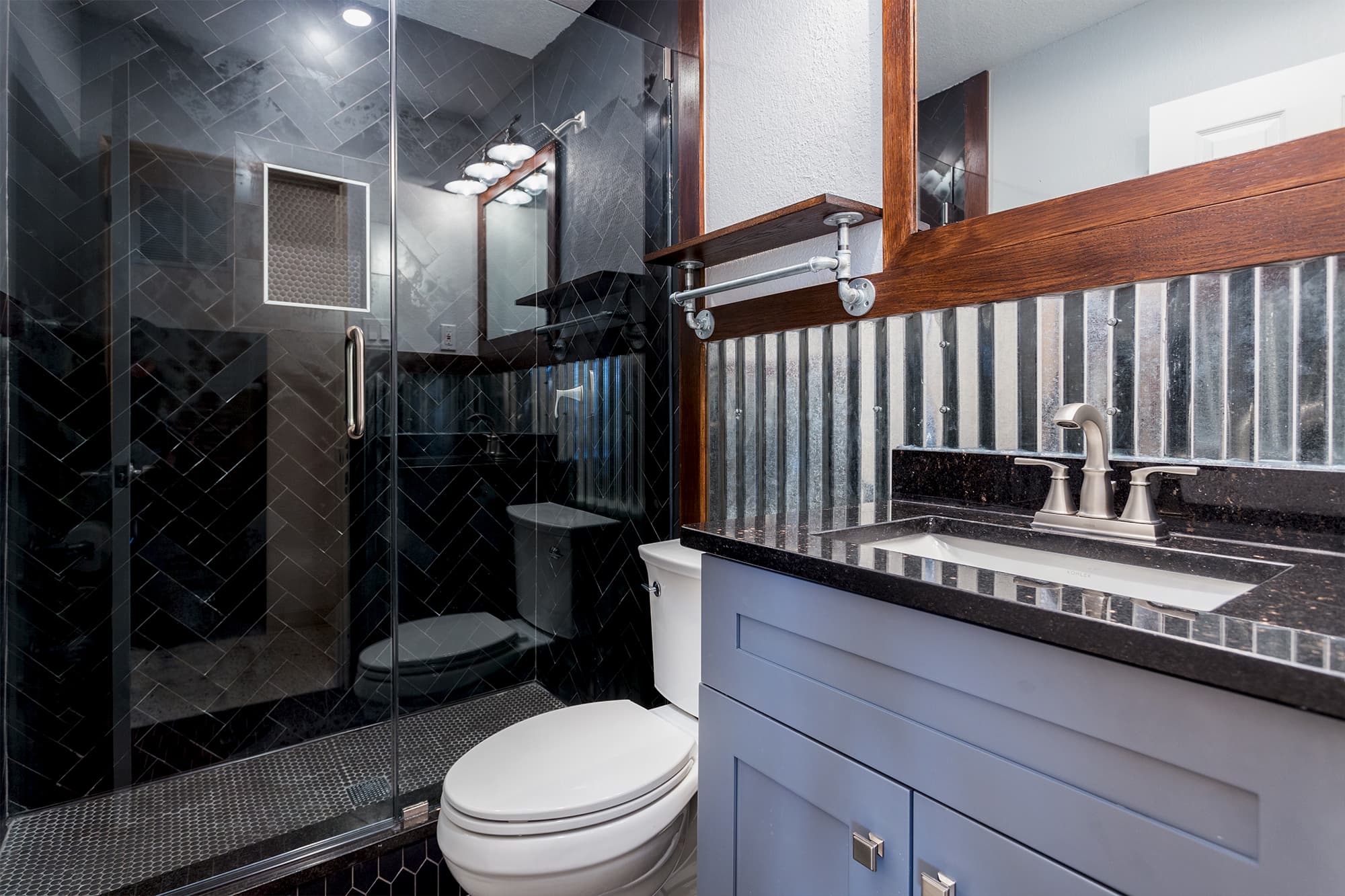 Completed luxury bathroom remodel by Revolution Contractors in St. Petersburg