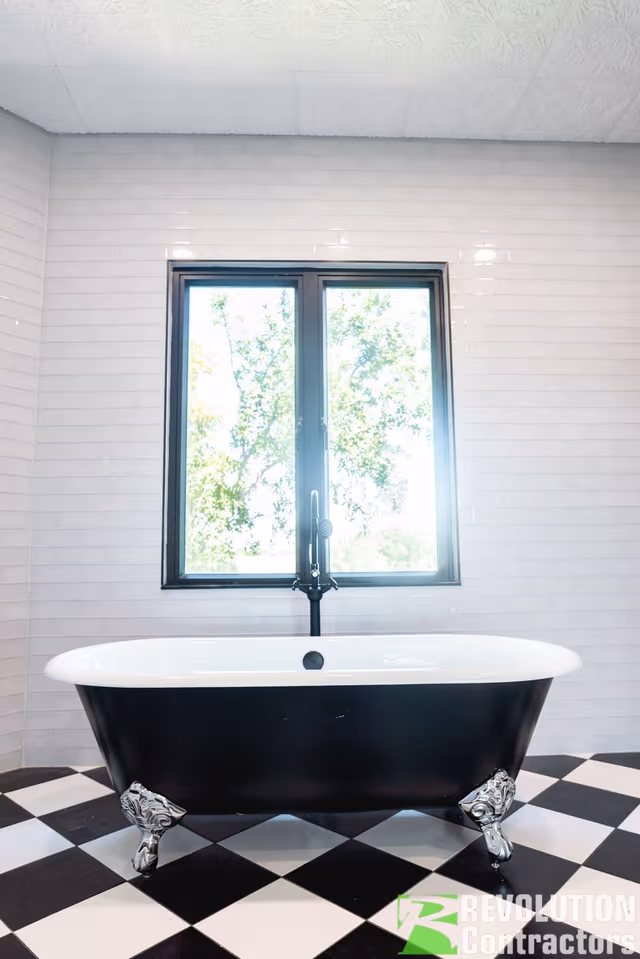 Completed bathroom remodel by Revolution Contractors