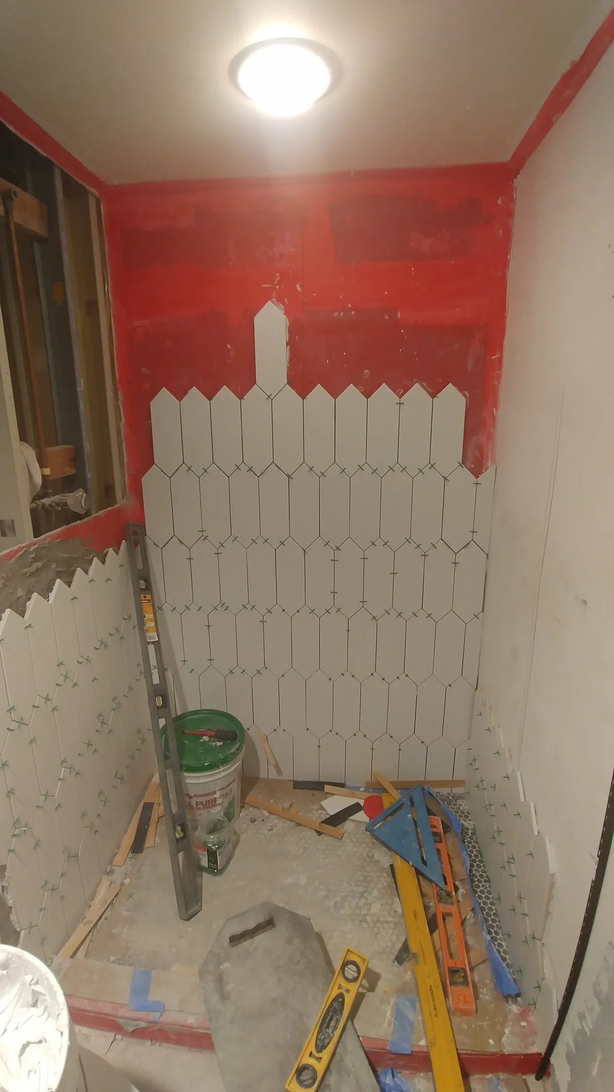 Mid-construction St. Petersburg bathroom with Schluter Kerdi waterproofing in place