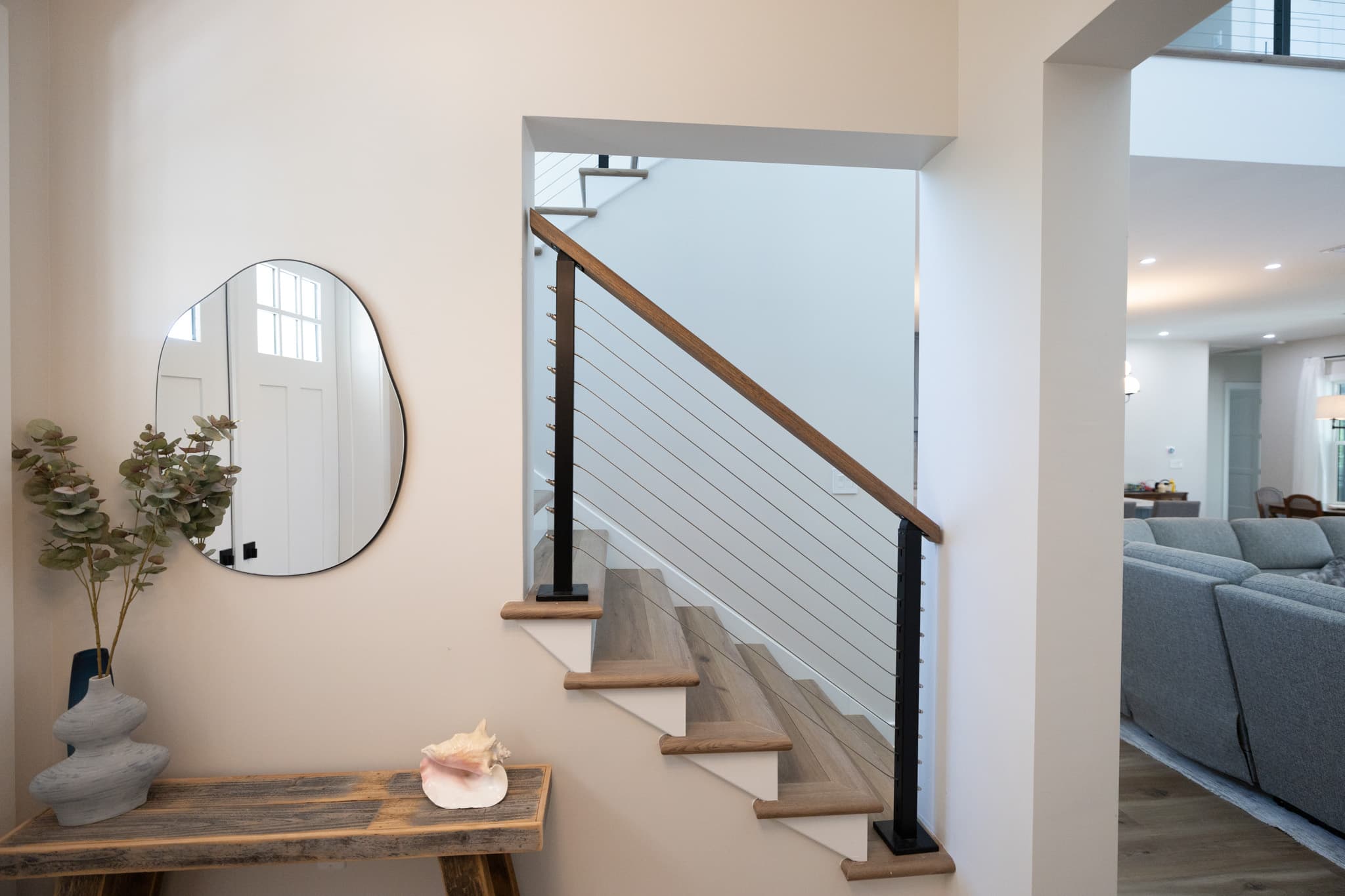 Finished staircase in elevated flood zone home renovation