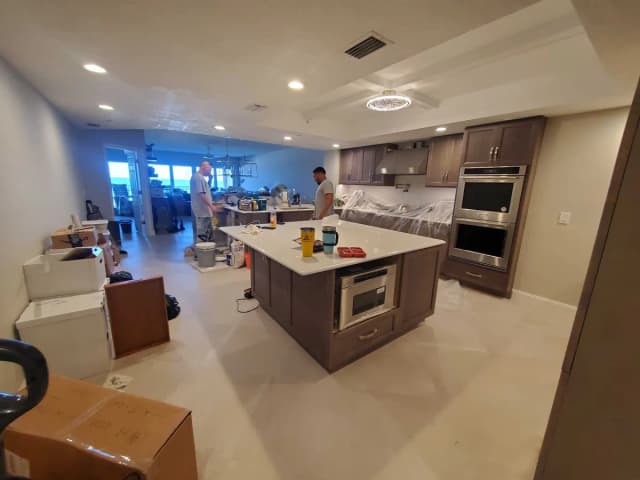 Cramped galley kitchen in an older St. Petersburg home before remodeling