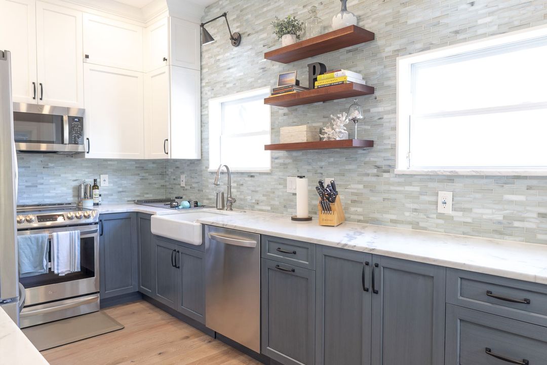 Downtown St. Petersburg townhome kitchen opened to living room with modern finishes